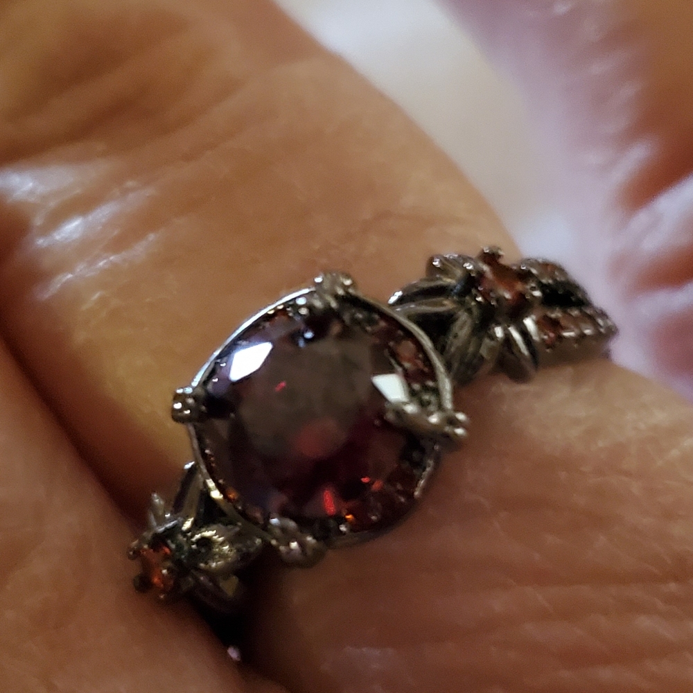 Garnet colored ring on black band - Picture 3 of 5